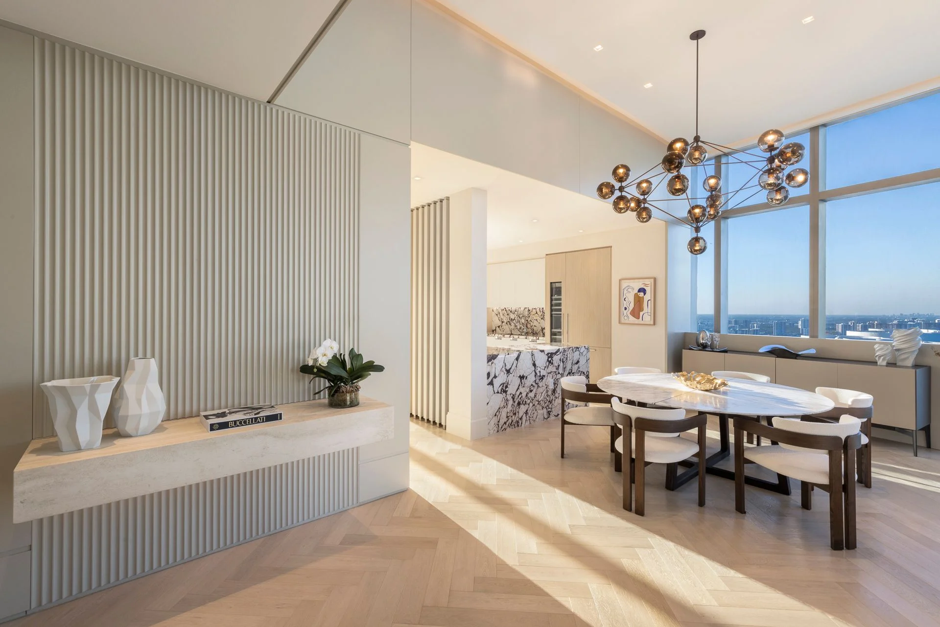 Ritz-Carlton Residences, Private Residences, Sunny Isles Beach, Miami, dining room fluted wall herringbone oak floor