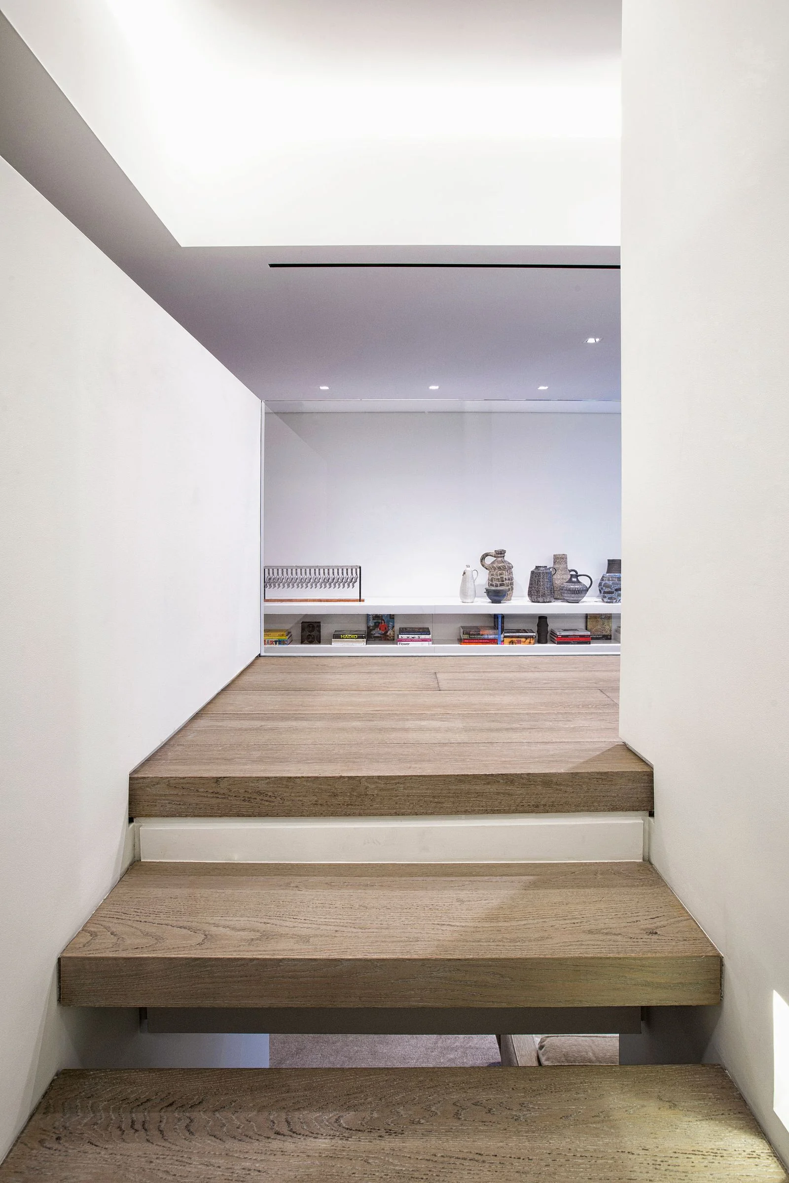 OM Townhouse, New York, staircase landing grey oak floor