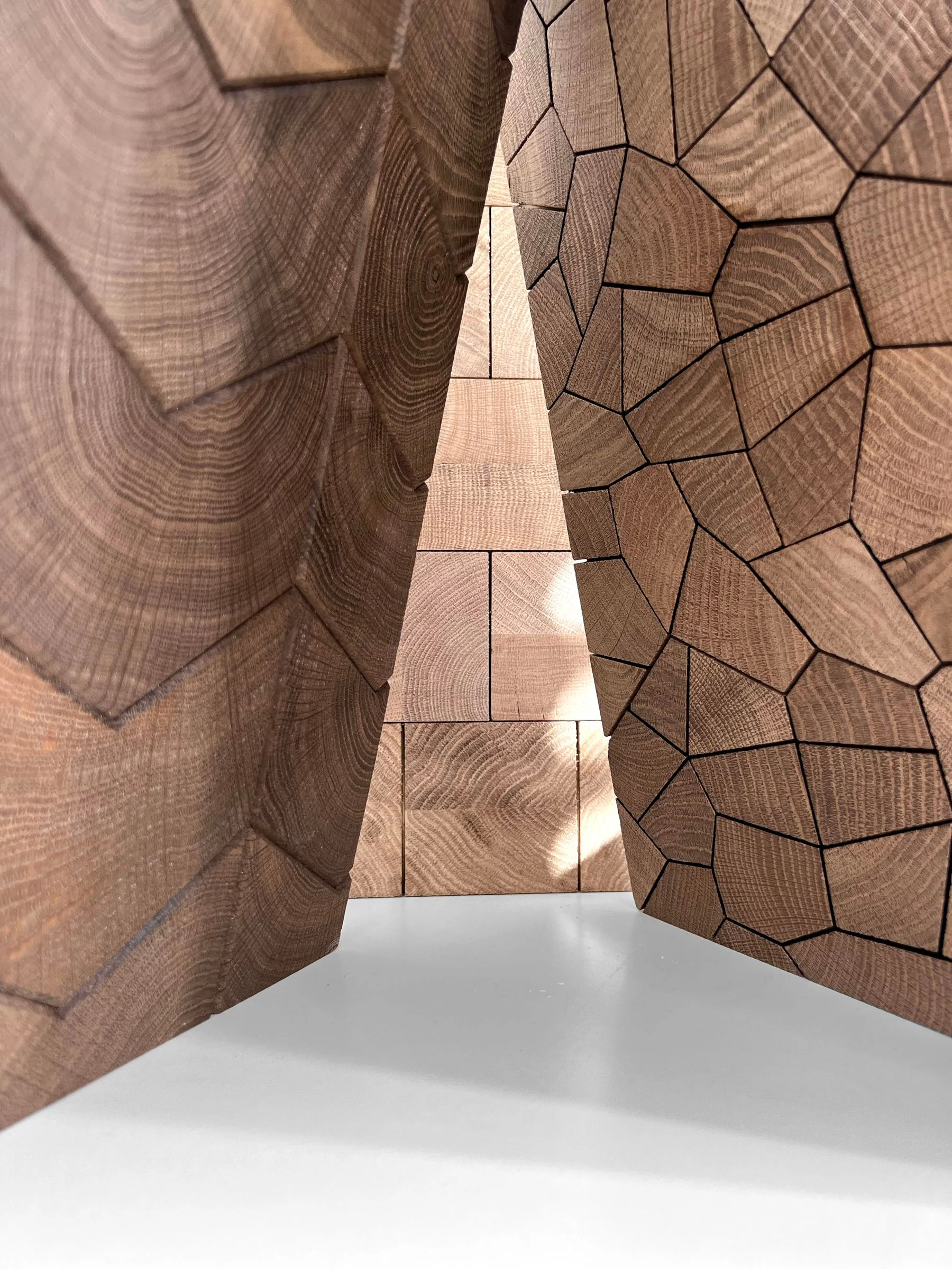 Two sample panels meeting at a corner, chevron against a crazed grid